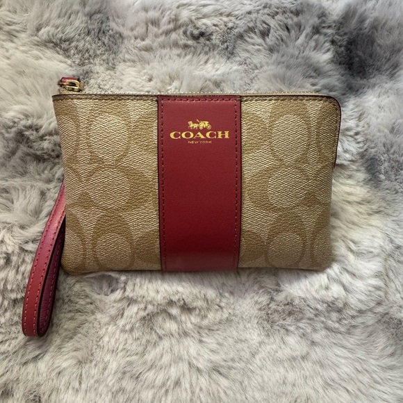 Coach Handbags - Coach Tan and pink Wristlet